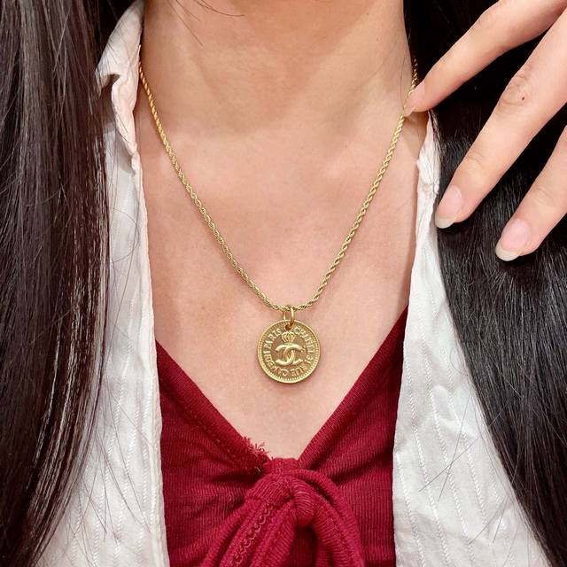 Chanel Vintage Letter Necklace. Chanel's designs truly need no introduction; eve