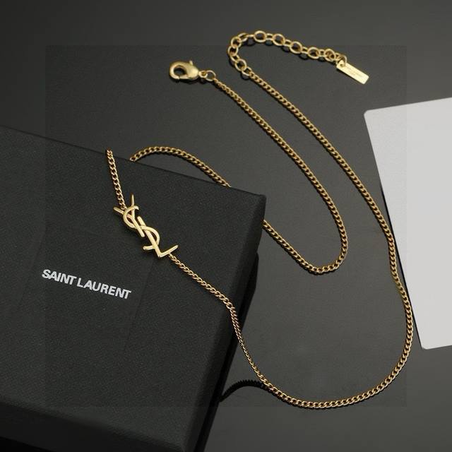 YSL Saint Laurent Necklace, original brass material. Yves Saint Laurent, founded