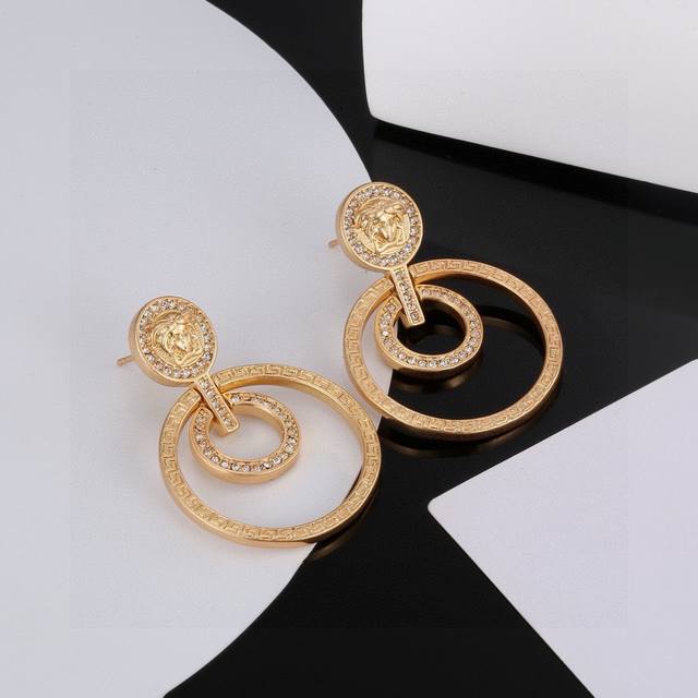 Versace Medusa earrings are an unmissable accessory that completely transforms y