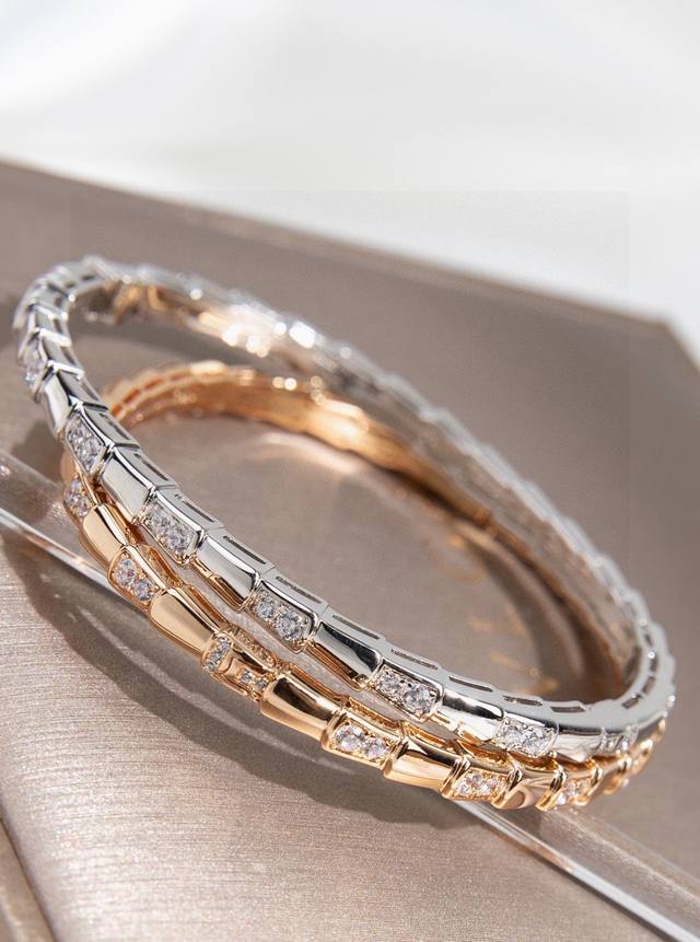Bulgari Serpenti Viper bracelet, featuring interlocking diamonds and a thick gol