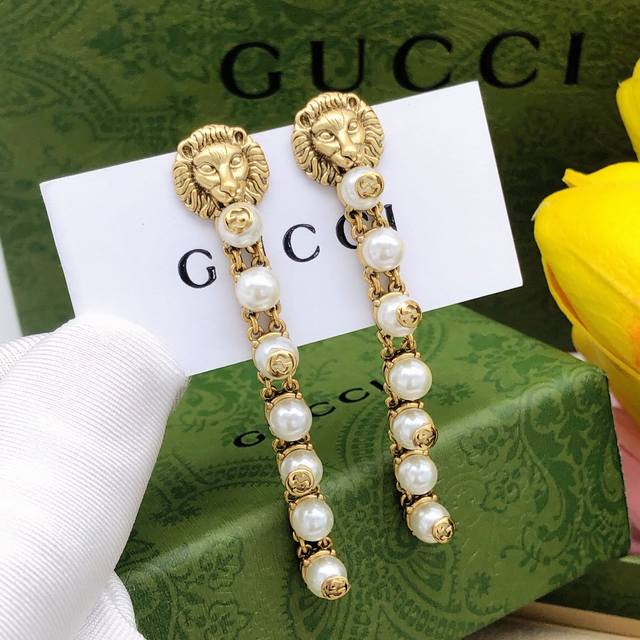 Item No. Ged0141 Gucci Lion Tassel Earrings. Cool lion design, antique bronze co