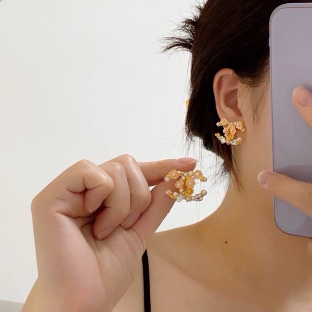 Exclusively original Chanel Camellia Diamond and Pearl Earrings, the latest Chan