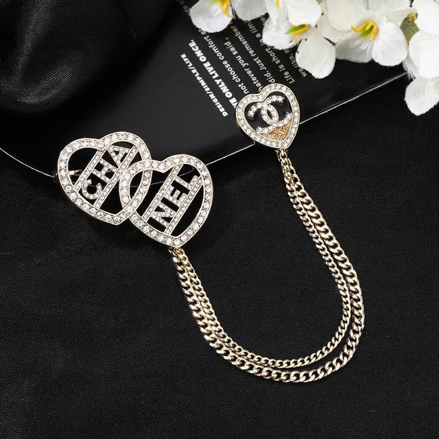 New Chanel Heart Brooch Available Now at Boutiques! The double C brooch is metic