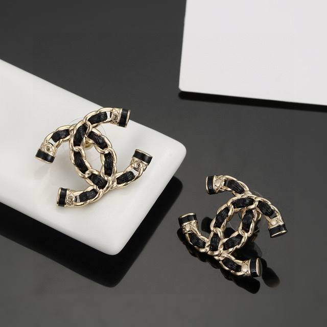 Chanel small black leather stud earrings, high-end quality, same material as bou