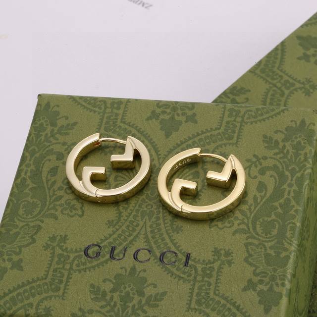 Gucci earrings, exquisitely crafted to the point of being breathtaking. Because