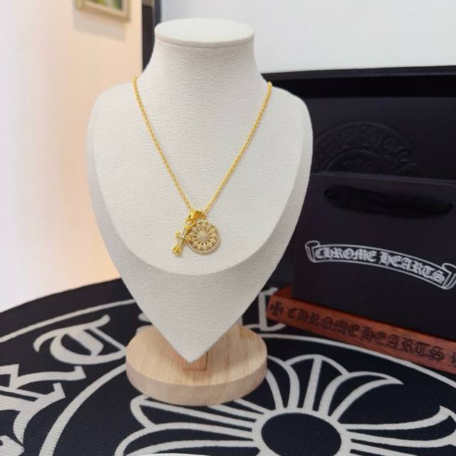 Genuine quality Chrome Hearts brooch cross necklace. The embossed design and var