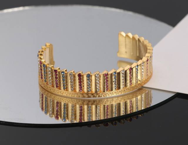 Versace Medusa face relief floral vine pattern metallic bracelet, brass material