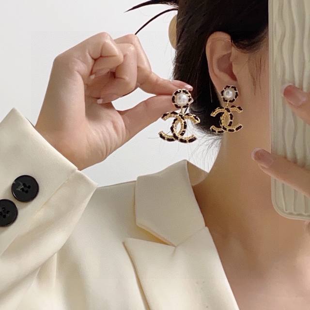 Chanel New Black Leather Earrings - Available Now at Boutiques. Made of brass wi