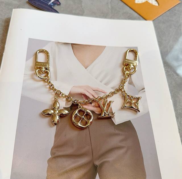 LV Keychain Bag Charm, Gold & Silver. This Spring Street Chain bag charm transfo