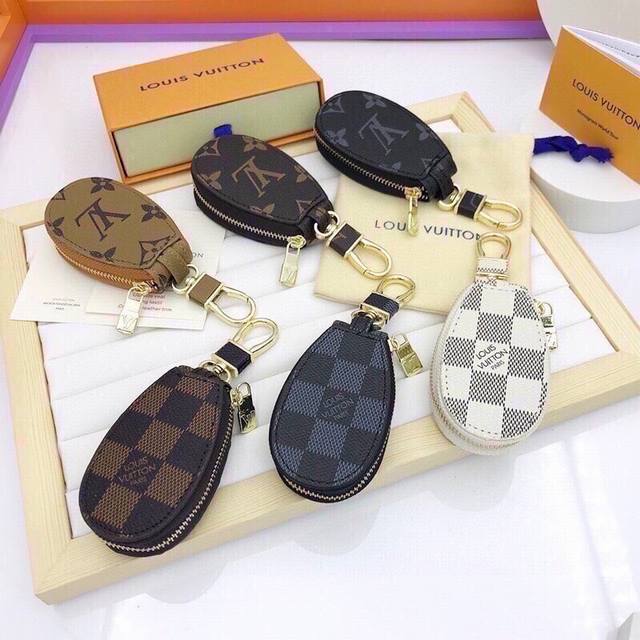 Louis Vuitton classic monogram car key pouch with box. Exclusive original produc