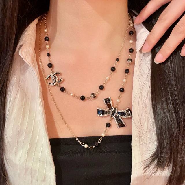 Chanel vintage letter sweater chain necklace. Chanel's designs truly need no int