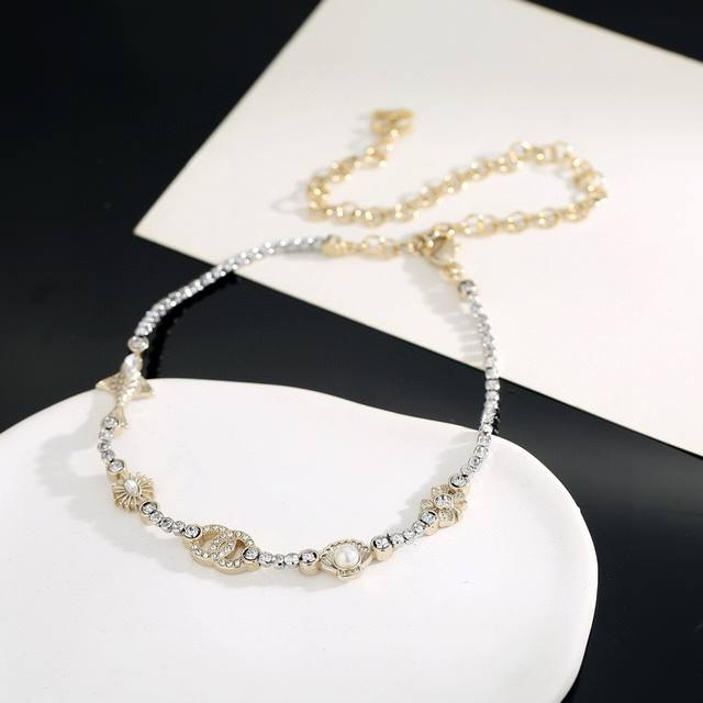 Today's New Arrival: Chanel Pearl Shell Necklace (25C) with Full Gold Diamond Do