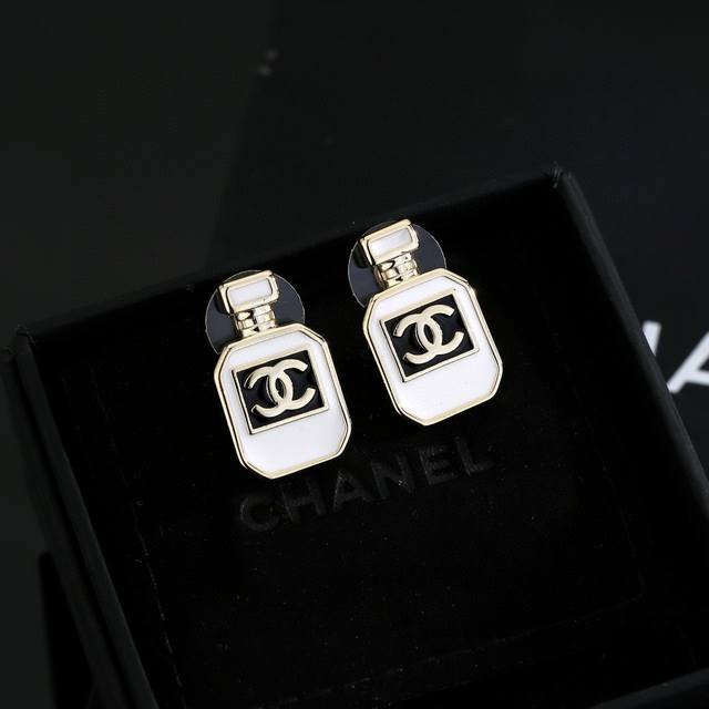Chanel perfume bottle earrings. These are versatile and stylish, easy to match w