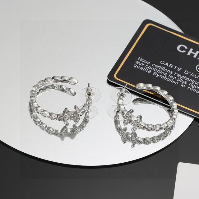Chanel hoop earrings, a fashionable and stylish piece from Chanel's early spring