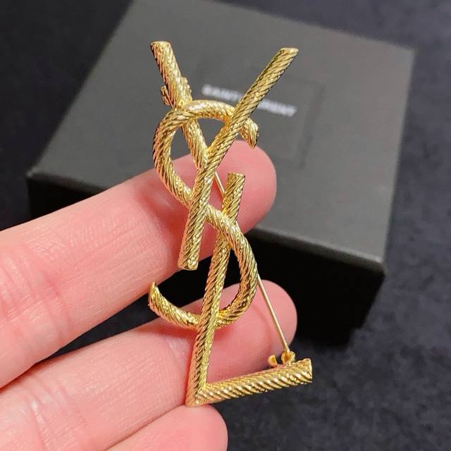 YSL Saint Laurent new small brooch, the perfect accessory for women. Women who d
