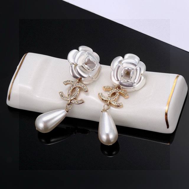 Chanel Double C Camellia Pearl and Diamond Earrings: A stunning design, breathta