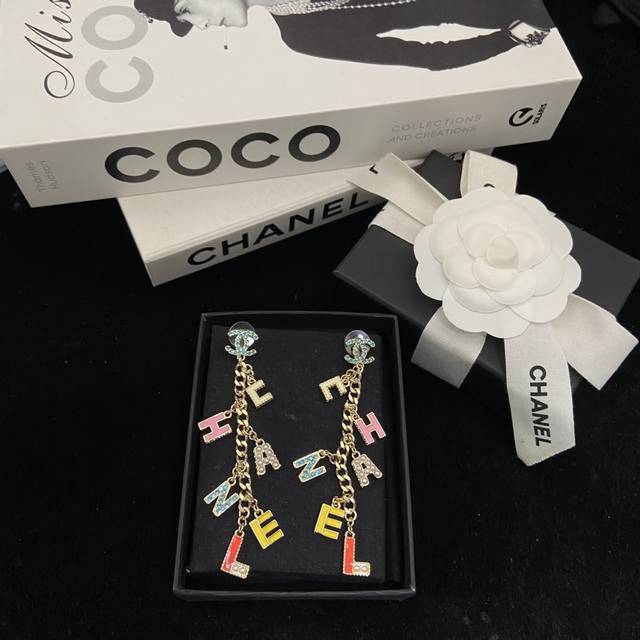 Today's New Arrival: Chanel Colorful Enamel Letter Tassel Earrings. Eye-catching