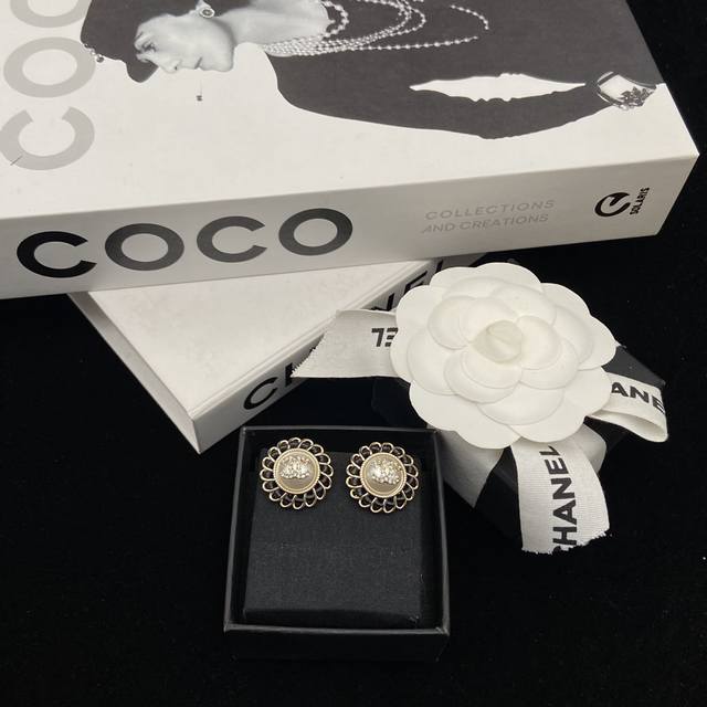 Today's Pick: Chanel's new 24K leather-strapped button earrings. Romantic and el