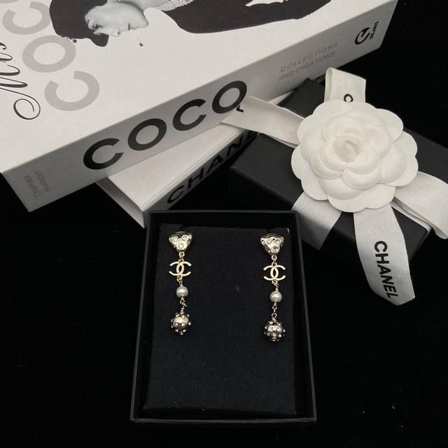 Chanel New Double C Round Tassel Earrings Super flattering and makes your face l