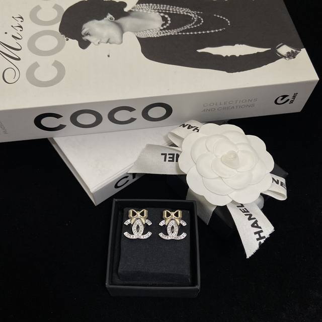 Chanel New 24K Bow Earrings Hollow out butterfly design with carved lines Sweet