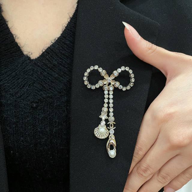 Chanel's newest brooches are now available at boutiques. Chanel brooches are the