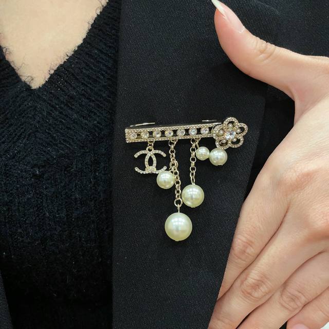 Chanel's newest brooches are now available at boutiques. Chanel brooches are the