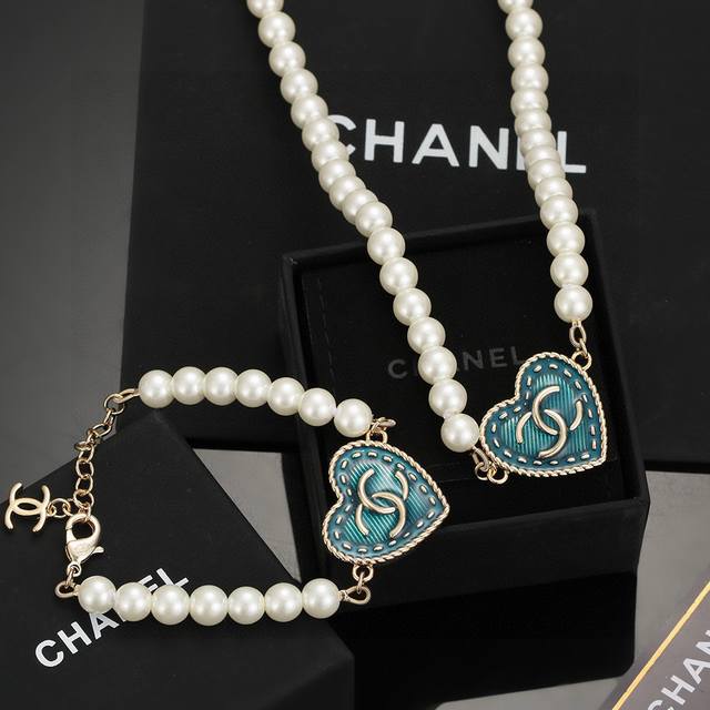 Chanel New Double C Heart Peach Vintage Blue Pearl Bracelet and Necklace. This v