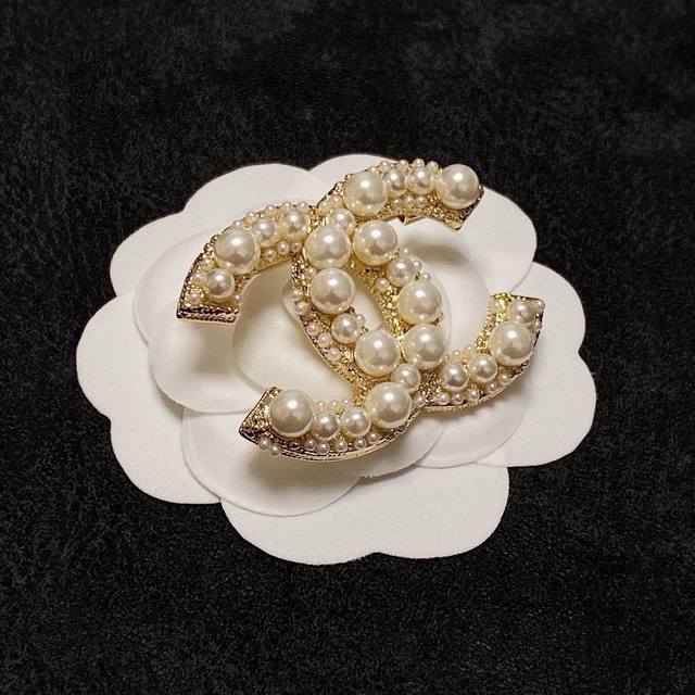 Chanel's newest brooches are now available at boutiques. Chanel brooches are the