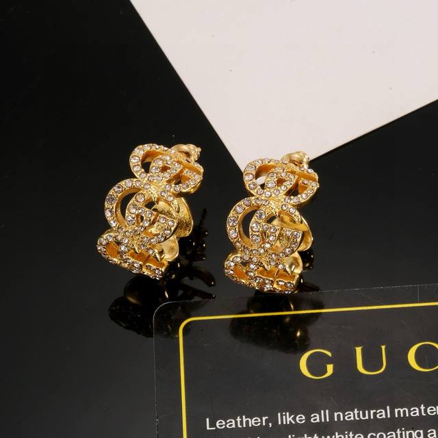 Gucci earrings, exquisitely crafted to the point of being breathtaking. Because