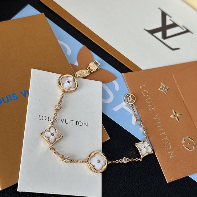 Louis Vuitton LV gold natural white mother-of-pearl bracelet. The natural mother
