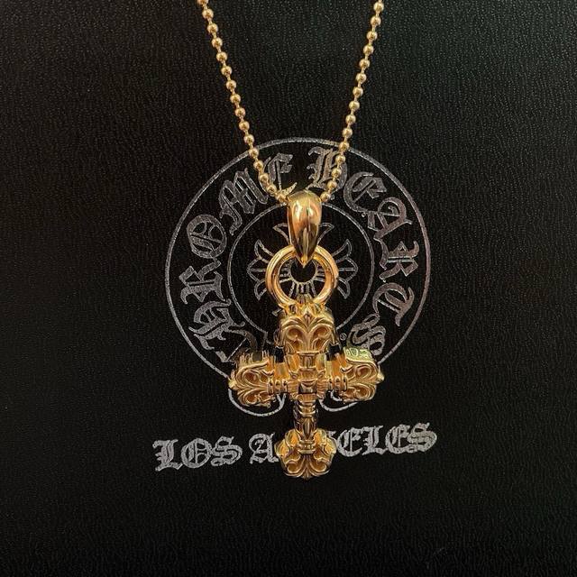 New Arrival! Chrome Hearts Gold-Plated Flame Cross Necklace. A classic piece tha