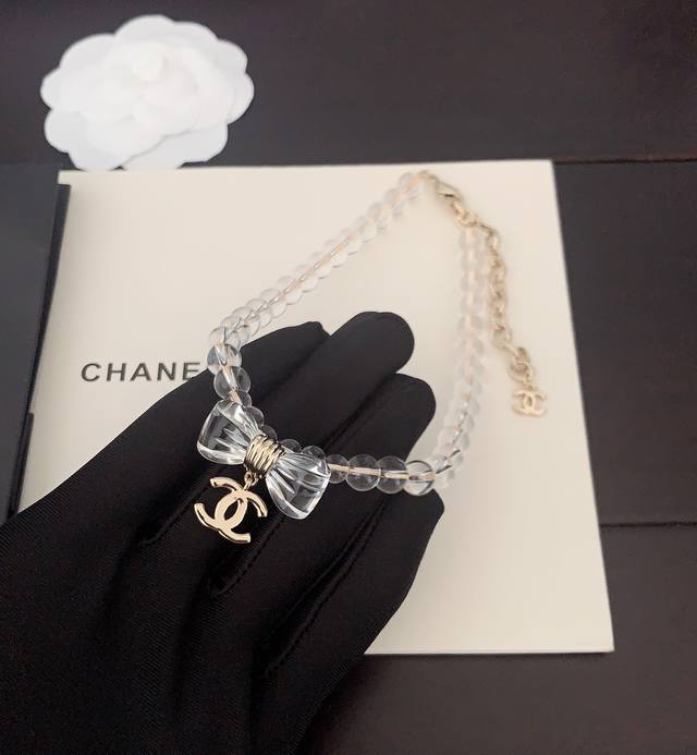 Ch*Nel Latest Transparent Bow Necklace, identical to Zp, made of brass.