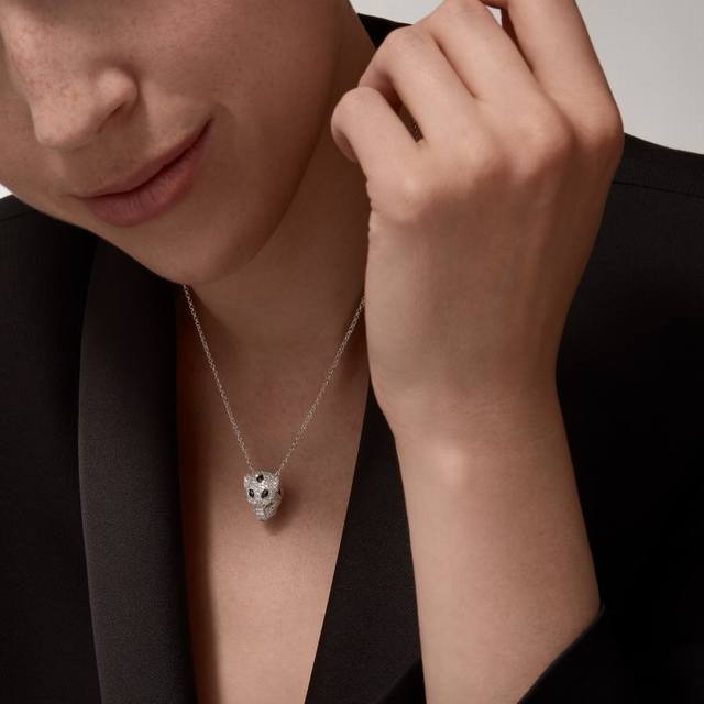 Cartier spotted panther head necklace in matte gold material. An incredibly powe