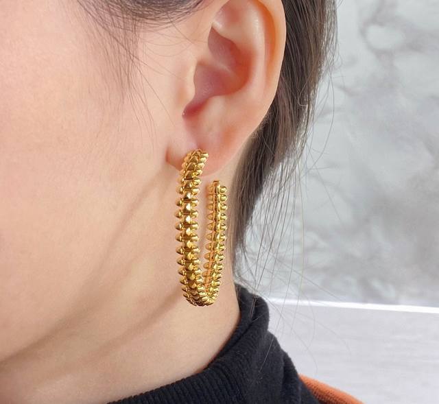 V-shaped gold-plated Cartier CNC large bullet earrings, featuring original UFO-s