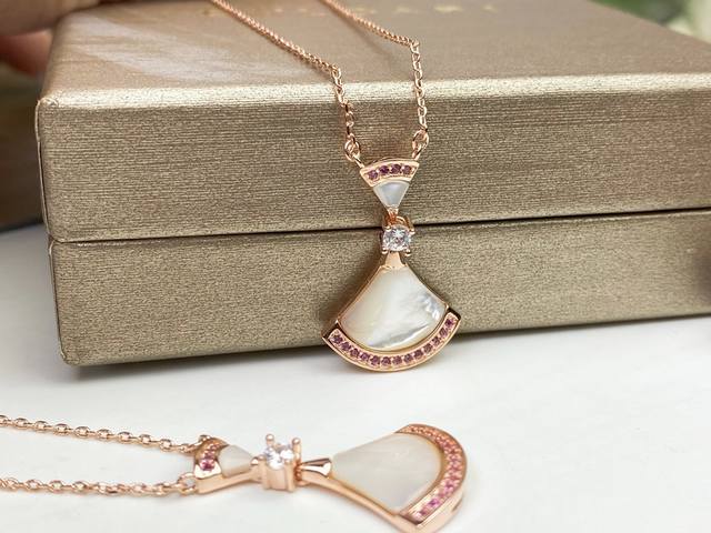Bvlgari shell dress necklace with pink diamonds and white mother-of-pearl. Whole
