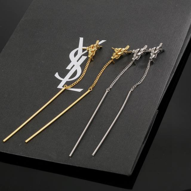 YSL Saint Laurent earrings, original brass material. Yves Saint Laurent, founded