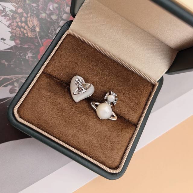 UK proxy purchase: Vivienne Westwood Saturn earrings. Elegant and sophisticated