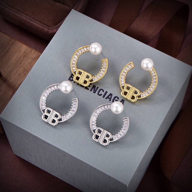 Original Balenciaga new earrings, identical to those in boutiques, made of brass