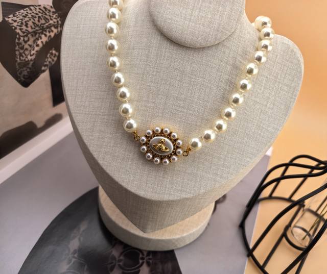 Necklace, UK import. Vivienne Westwood Saturn Set. Elegant and sophisticated des