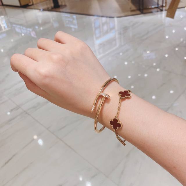 We offer a classic diamond-encrusted nail bracelet, available in a thicker versi