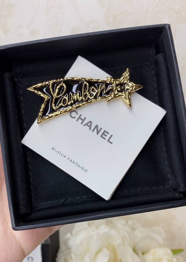 High-quality details as pictured! Chanel Black & Gold Letter Lava Star Brooch, S