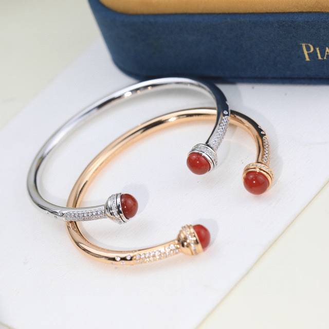 Piaget Bangle - Piaget's latest gemstone rotating bracelet from the boutique. A