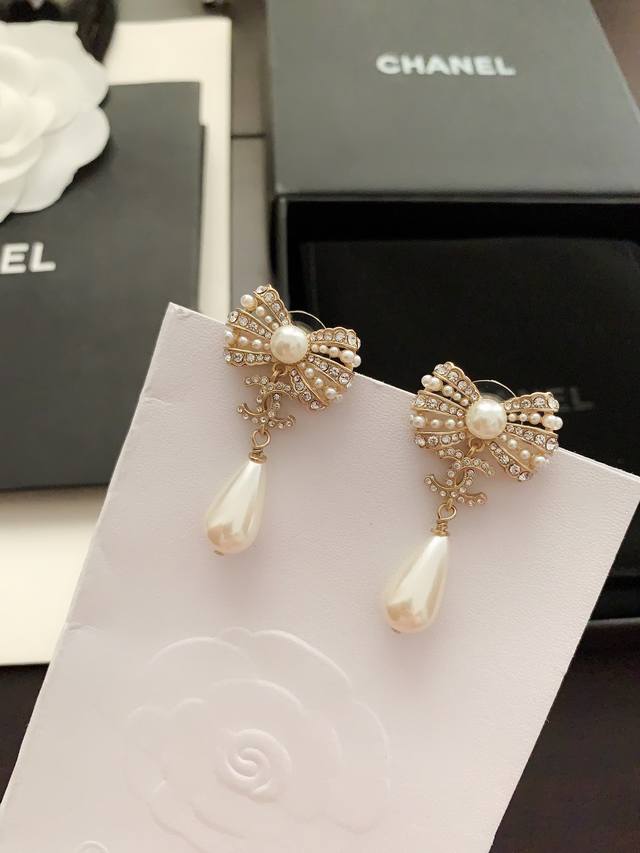Ch*Nel Pearl Bow Earrings, matching Zp material Ddd
