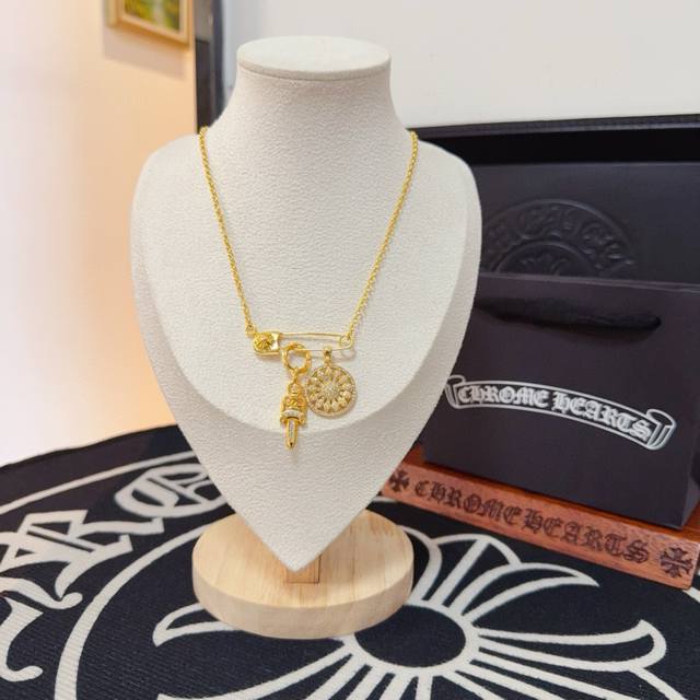 New boutique quality Chrome Hearts brooch cross necklace. The embossed design an