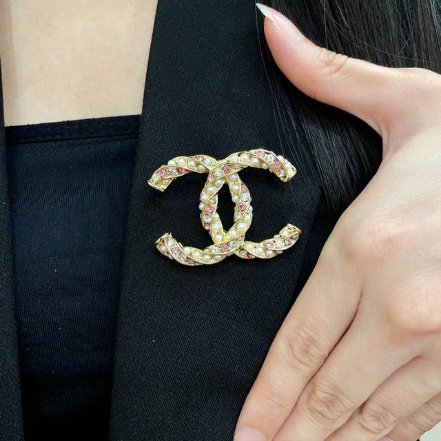 Chanel's newest brooches are now available at boutiques. Chanel brooches are the