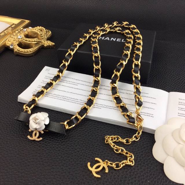 Chanel Camellia Waist Chain: Made of select lambskin and crafted from brass plat