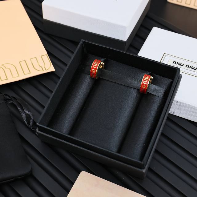 Miumiu Enamel Letter Circle Earrings The Miumiu logo design element; minimalism