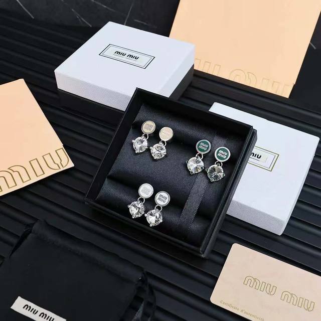 Miumiu Enamel Button Diamond Earrings Featuring Miumiu's logo design elements, m