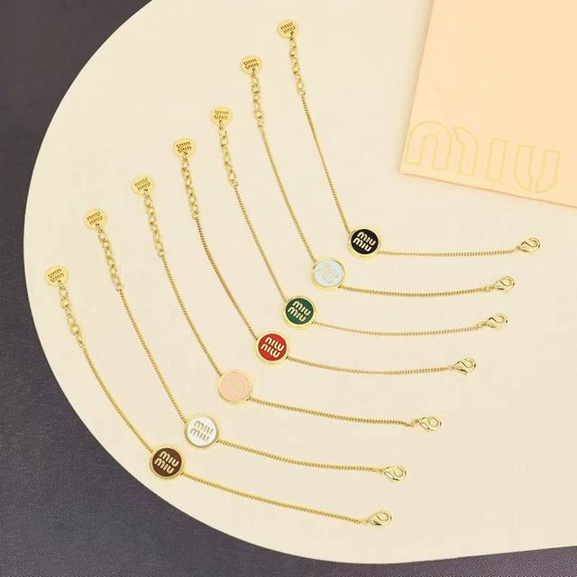 Miumiu Candy Color Enamel Letter Button Bracelet. Featuring Miumiu's logo design