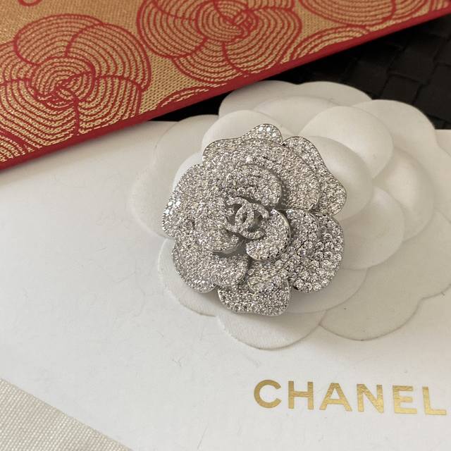 Chanel's new seasonal jewelry, a full-diamond 3D camellia brooch. Exquisite and